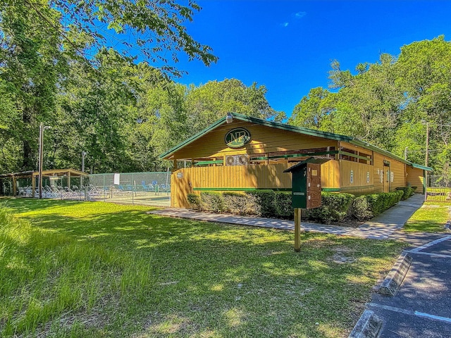 exterior space featuring a lawn