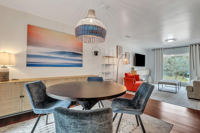 dining room with hardwood / wood-style flooring