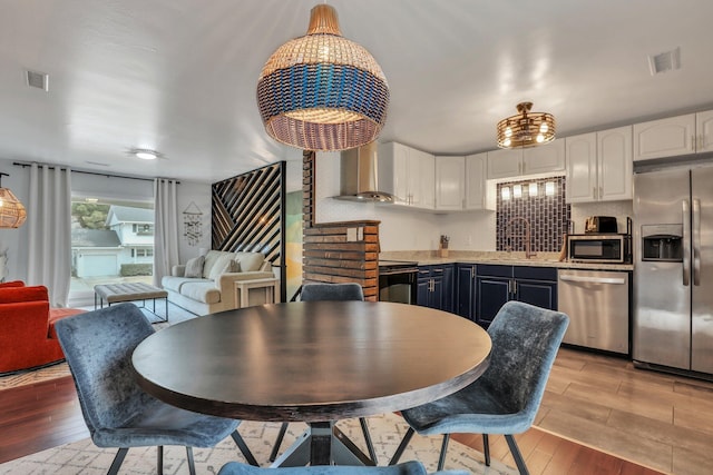 dining room featuring sink