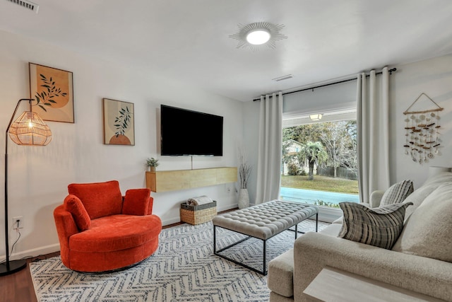 living room with hardwood / wood-style flooring