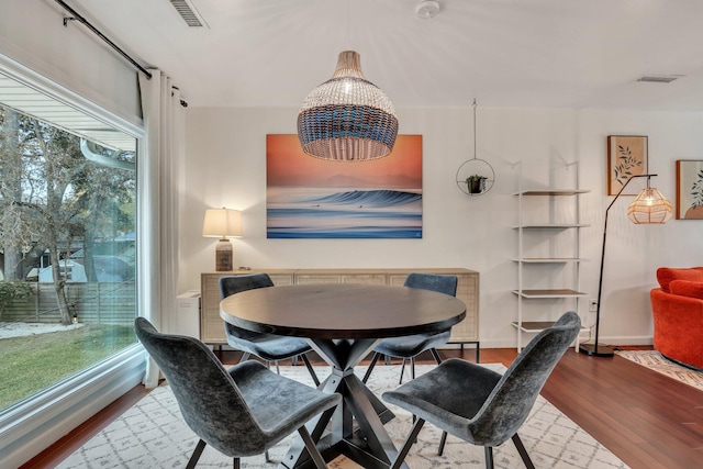 dining area featuring hardwood / wood-style flooring