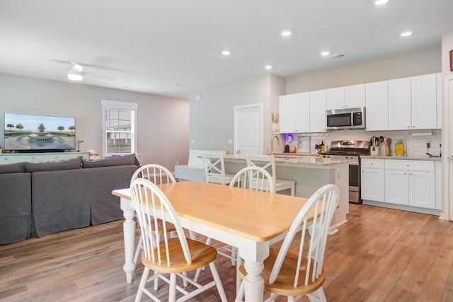 352 Matuskovic Dr, Charleston, SC 29414 - dining area featuring light wood-type flooring and recessed lighting