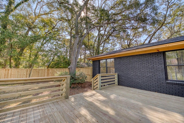 wooden terrace with fence