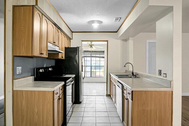 kitchen with sink, black electric range, ceiling fan, light tile patterned floors, and a textured ceiling