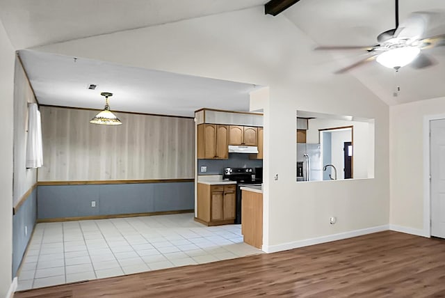 kitchen featuring lofted ceiling with beams, hanging light fixtures, black / electric stove, light hardwood / wood-style floors, and stainless steel fridge with ice dispenser