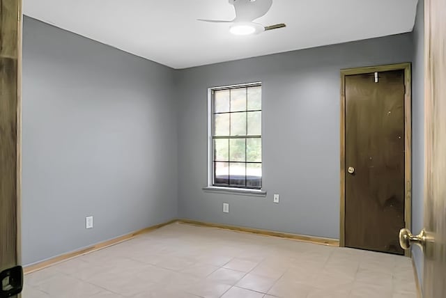 unfurnished room featuring ceiling fan