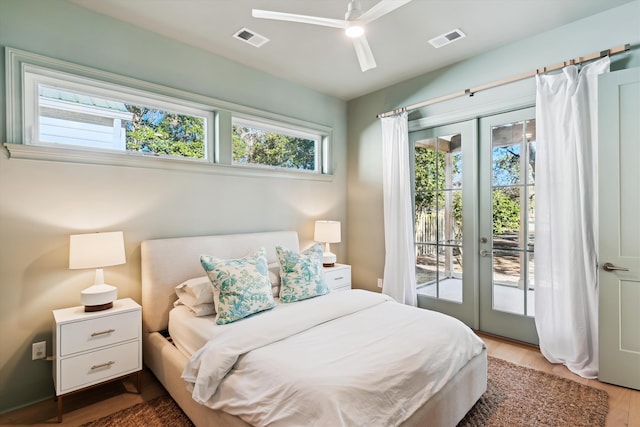 bedroom with hardwood / wood-style floors, ceiling fan, access to exterior, and french doors