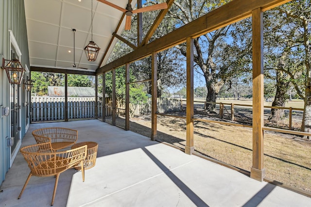 sunroom / solarium with vaulted ceiling