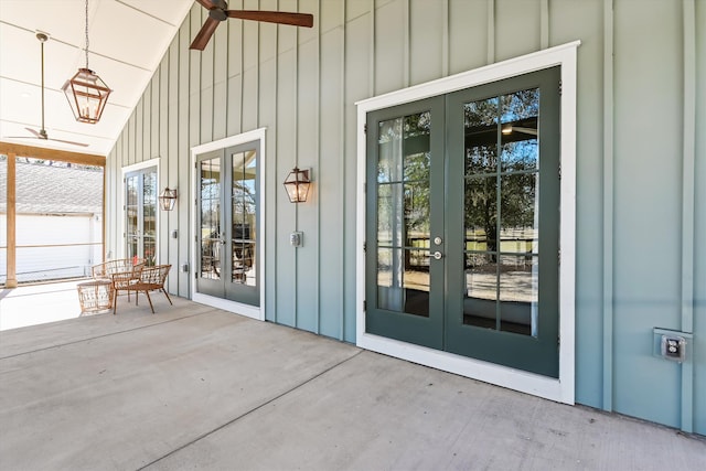 doorway to property featuring ceiling fan, a patio area, and french doors