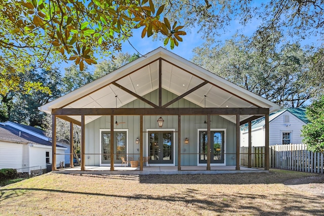 back of property featuring french doors