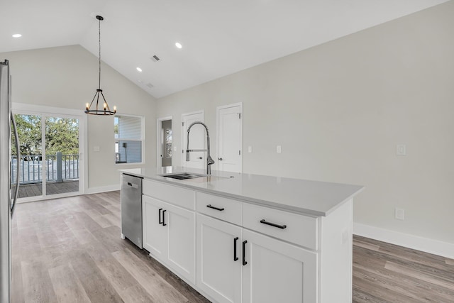 kitchen with a sink, white cabinetry, light countertops, dishwasher, and an island with sink