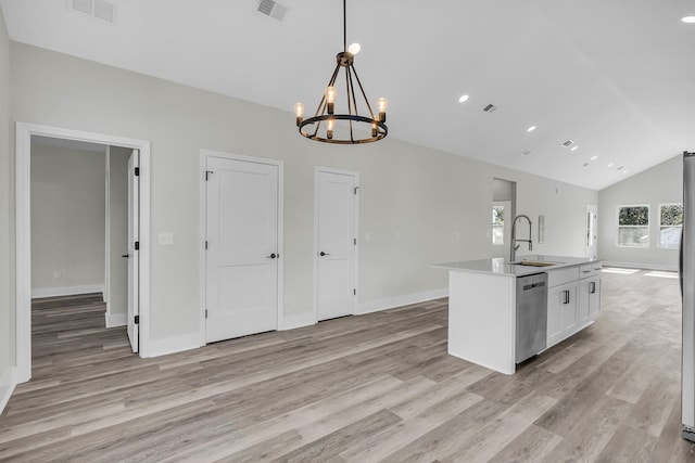 kitchen with a sink, white cabinetry, dishwasher, a center island with sink, and pendant lighting