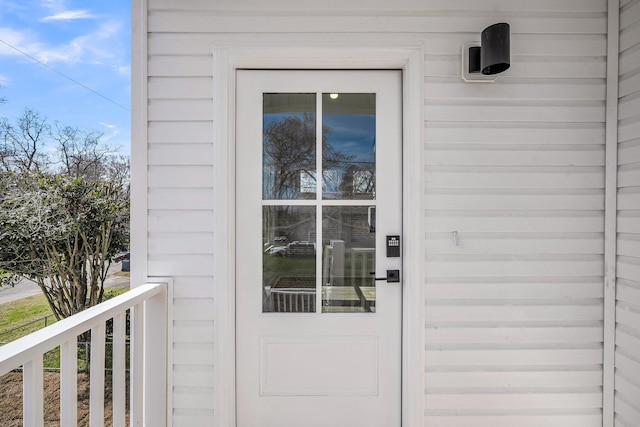 property entrance with a balcony