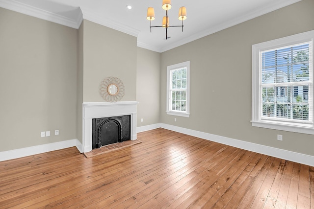 68 Vanderhorst St Unit B, Charleston, SC 29403 - unfurnished living room featuring a chandelier, ornamental molding, light wood finished floors, a fireplace with flush hearth, and recessed lighting
