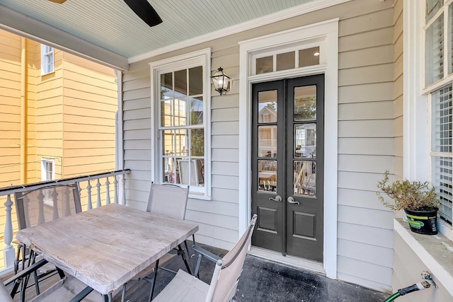 68 Vanderhorst St Unit B, Charleston, SC 29403 - property entrance featuring french doors, a ceiling fan, and outdoor dining area