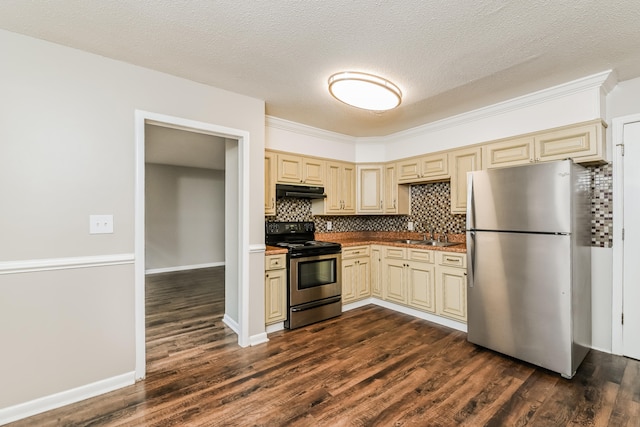 kitchen featuring a textured ceiling, backsplash, dark wood-type flooring, and stainless steel appliances