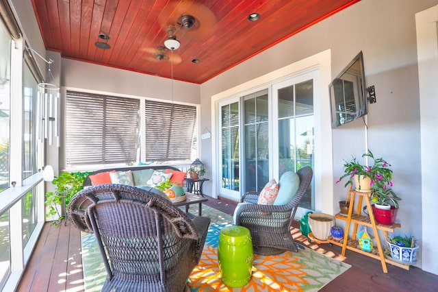 sunroom with wooden ceiling