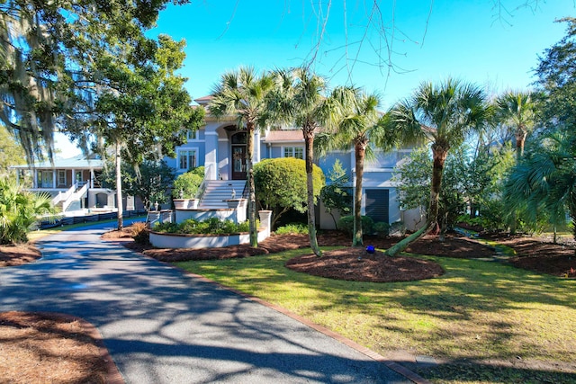 view of front of property with a front lawn