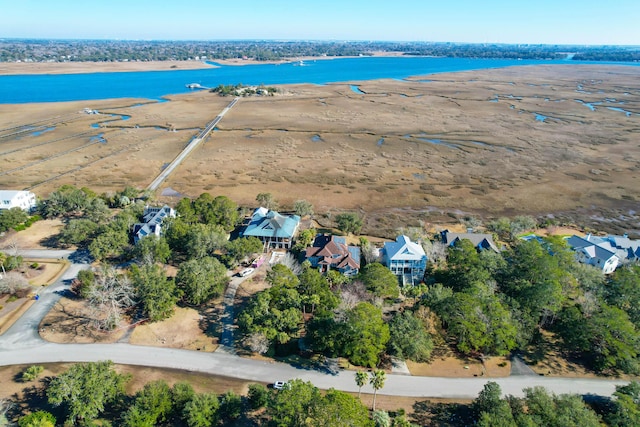 bird's eye view featuring a view of the beach and a water view