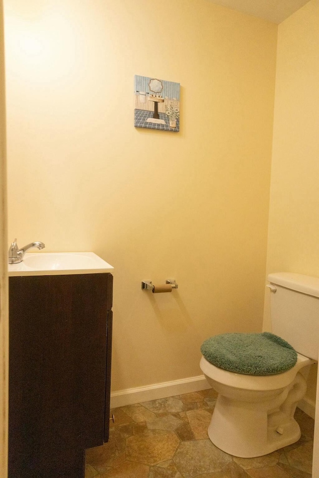 424 Salley Ackerman Dr, Cottageville, SC 29435 - bathroom featuring toilet, vanity, and baseboards