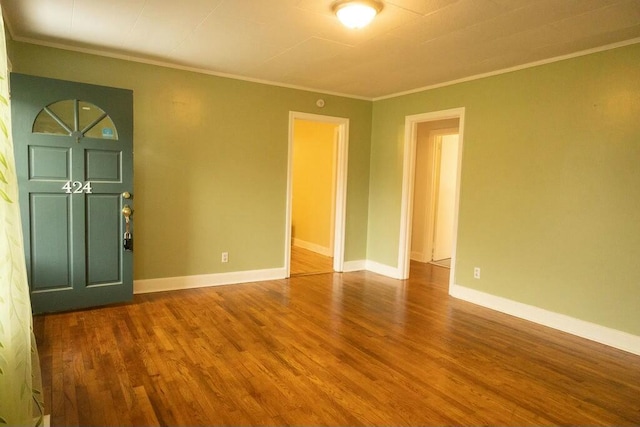 424 Salley Ackerman Dr, Cottageville, SC 29435 - empty room featuring crown molding, baseboards, and wood finished floors