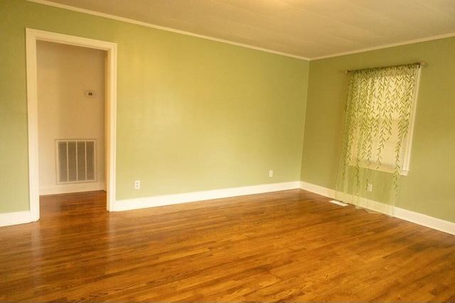 424 Salley Ackerman Dr, Cottageville, SC 29435 - spare room featuring crown molding, wood finished floors, visible vents, and baseboards
