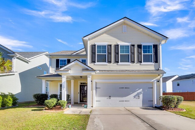 108 Glenspring Dr, Summerville, SC 29486 - traditional home featuring an attached garage, concrete driveway, and covered porch