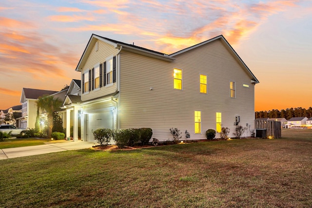 108 Glenspring Dr, Summerville, SC 29486 - view of property exterior with an attached garage, concrete driveway, a yard, and central AC unit