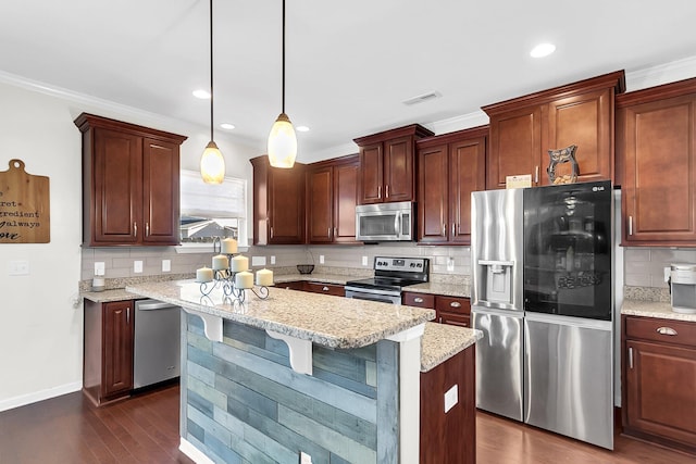 108 Glenspring Dr, Summerville, SC 29486 - kitchen featuring stainless steel appliances, decorative backsplash, dark wood finished floors, a kitchen island, and recessed lighting