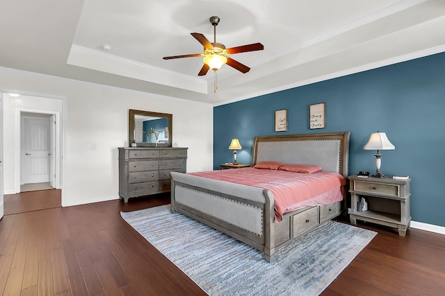 108 Glenspring Dr, Summerville, SC 29486 - bedroom featuring a tray ceiling, wood finished floors, baseboards, a ceiling fan, and crown molding