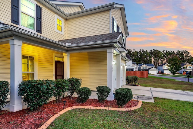 108 Glenspring Dr, Summerville, SC 29486 - view of side of home with a yard, a porch, and a garage