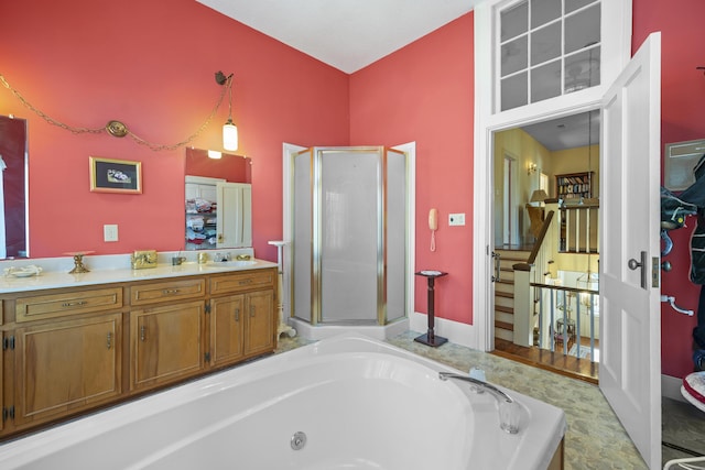 bathroom featuring vanity and separate shower and tub