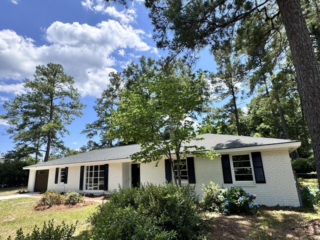 single story home with a garage