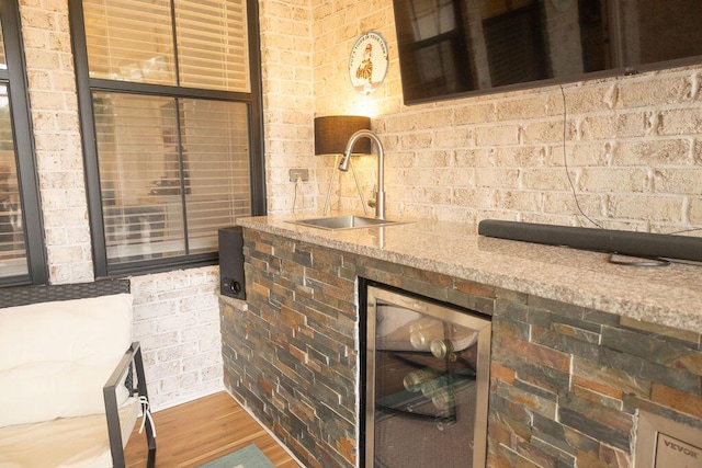 74 Longleaf Dr, Walterboro, SC 29488 - interior space featuring wood finished floors, a sink, and beverage cooler