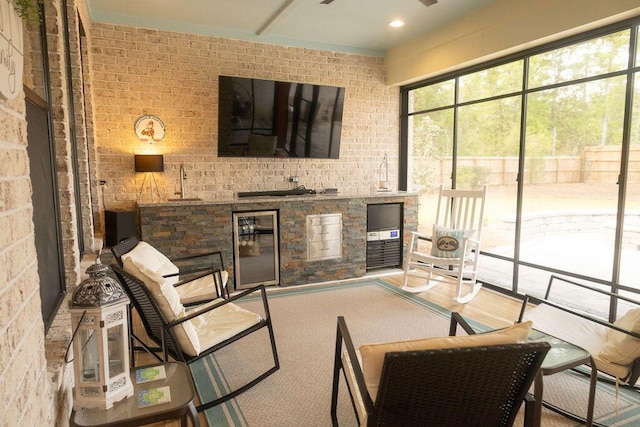 74 Longleaf Dr, Walterboro, SC 29488 - sunroom featuring a sink and beverage cooler