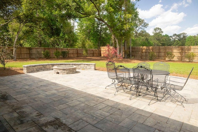 74 Longleaf Dr, Walterboro, SC 29488 - view of patio / terrace with an outdoor fire pit, a fenced backyard, and outdoor dining area