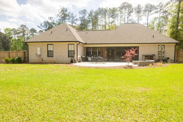 74 Longleaf Dr, Walterboro, SC 29488 - rear view of property with a patio area, brick siding, a yard, and fence