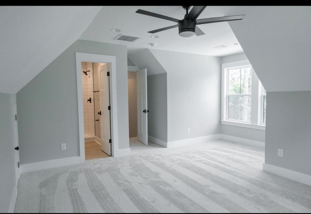 74 Longleaf Dr, Walterboro, SC 29488 - additional living space featuring visible vents, baseboards, ceiling fan, carpet floors, and lofted ceiling