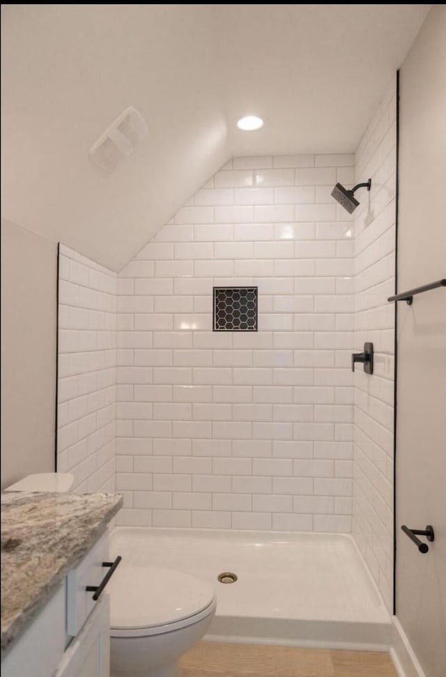 74 Longleaf Dr, Walterboro, SC 29488 - full bathroom with vanity, a stall shower, recessed lighting, toilet, and lofted ceiling