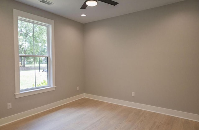 74 Longleaf Dr, Walterboro, SC 29488 - empty room with light wood-type flooring, visible vents, baseboards, and a ceiling fan