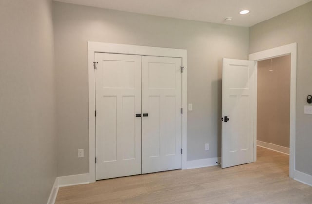 74 Longleaf Dr, Walterboro, SC 29488 - unfurnished bedroom with a closet, recessed lighting, light wood finished floors, and baseboards