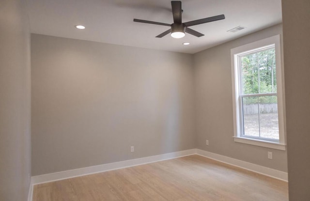 74 Longleaf Dr, Walterboro, SC 29488 - spare room with visible vents, baseboards, ceiling fan, light wood-style floors, and recessed lighting