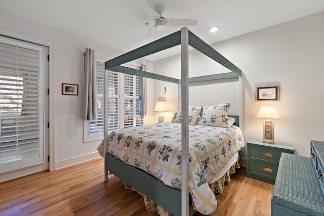 bedroom featuring ceiling fan and light hardwood / wood-style floors