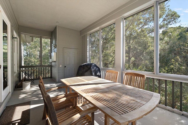 sunroom featuring a healthy amount of sunlight