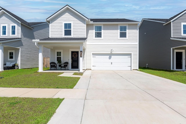 traditional-style house with concrete driveway, an attached garage, a front lawn, and covered porch