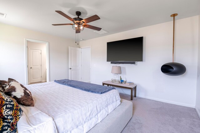 bedroom with carpet, baseboards, and ceiling fan