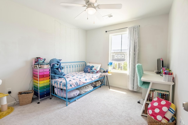 bedroom featuring carpet, a ceiling fan, and baseboards