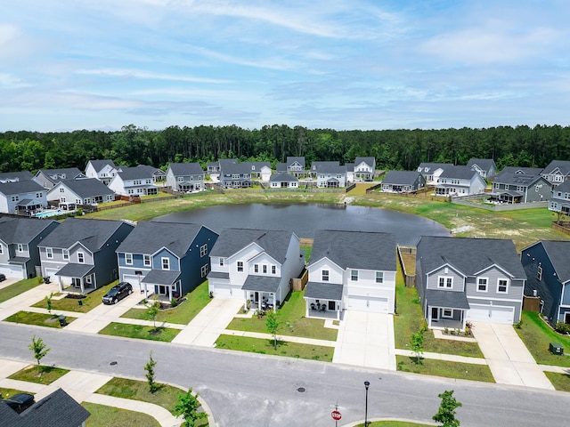 aerial perspective of suburban area featuring a large body of water