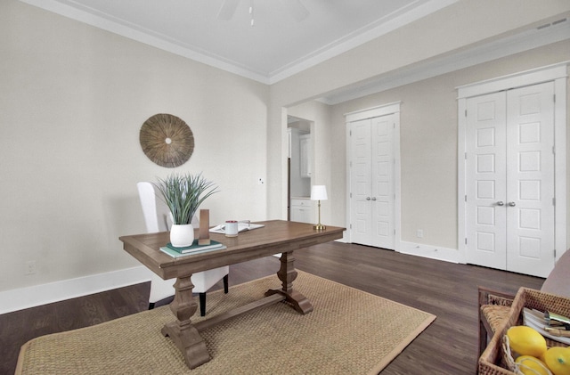 home office featuring ceiling fan, dark hardwood / wood-style floors, and crown molding