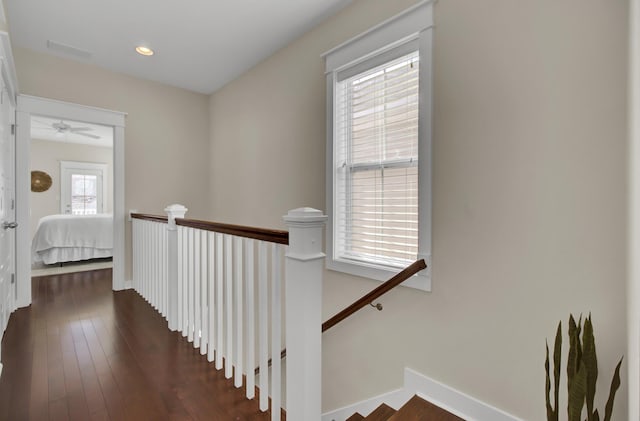 stairway with wood-type flooring